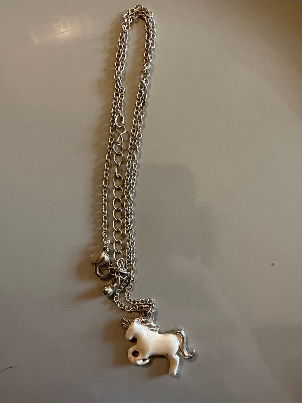 Source Unknown Silver and White Unicorn Pendant Necklace